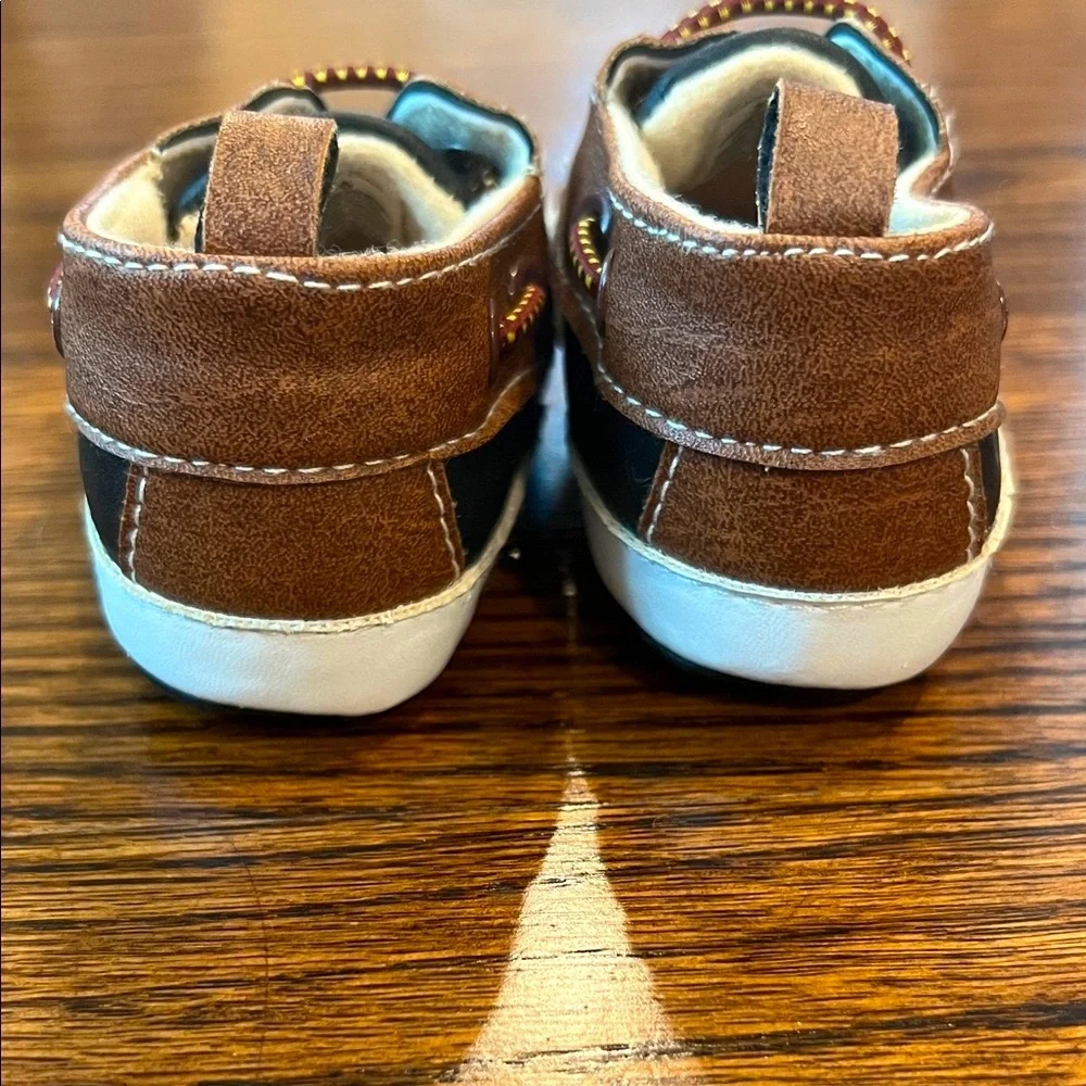 Rising Star Black and Tan Baby Moccasins